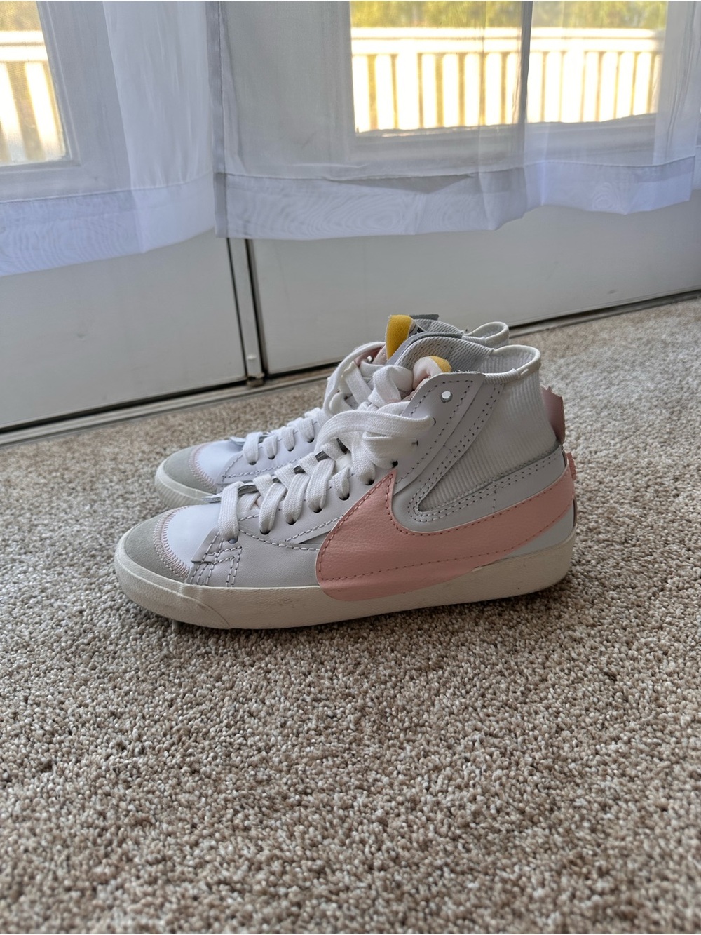 Nike Women’s White High-Top Sneakers with Pink Swoosh and Yellow Tongue